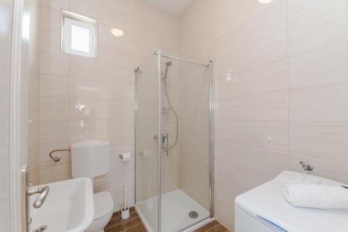 Ένα μπάνιο στο Apartments Kampanel
