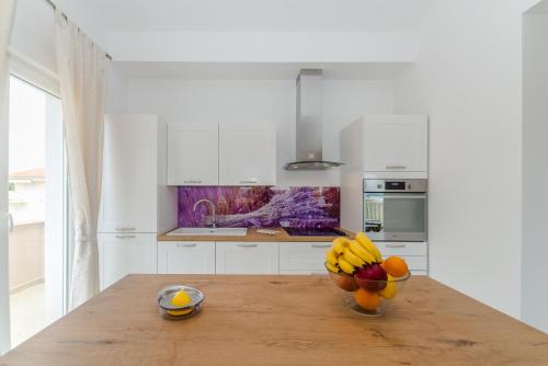 Η κουζίνα ή μικρή κουζίνα στο Apartments Kampanel