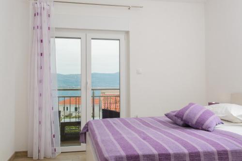 Posteľ alebo postele v izbe v ubytovaní Apartments Brico - Heated Pool