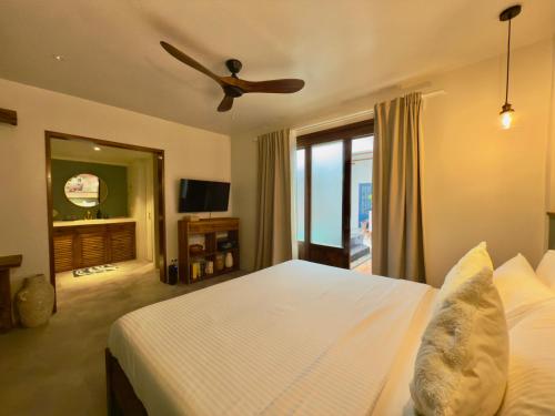 Cama o camas de una habitación en Lugadia Villas