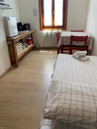 Postel nebo postele na pokoji v ubytování Pecore Ribelli