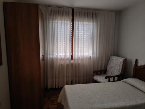 Cama o camas de una habitación en Casa Montse-Izquierda