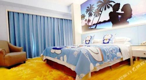 a bedroom with a blue and white bed and a chair at Hohhot Hai Liang Plaza Hotel in Hohhot