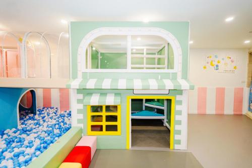 a lego play room with a lego house at DoubleTree by Hilton Shanghai Pudong - Present welcome cookie in Shanghai