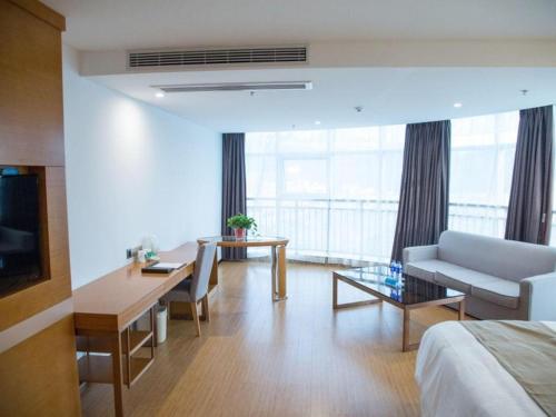 Χώρος καθιστικού στο GreenTree Inn Anqing Yuexixian Wenquan Branch