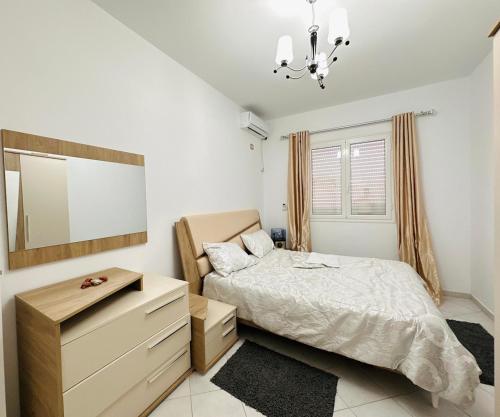 Ένα ή περισσότερα κρεβάτια σε δωμάτιο στο Djerba apartments 2