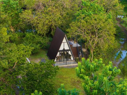 an overhead view of a small house in the woods at Camp Leopard - Yala Safari Glamping in Yala