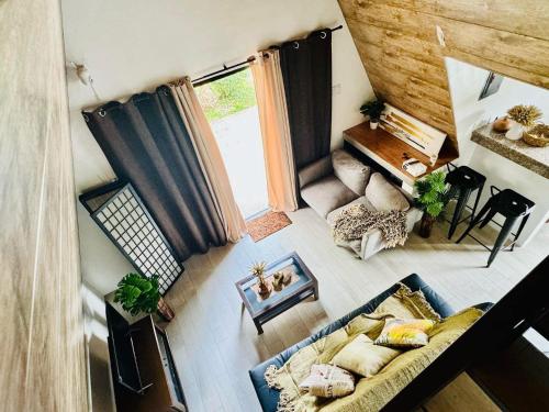 an overhead view of a living room with a couch at PRIVATE VILLA IN TAGAYTAY with PRIVATE POOL and Basketball Court LMN PLACE in Tagaytay