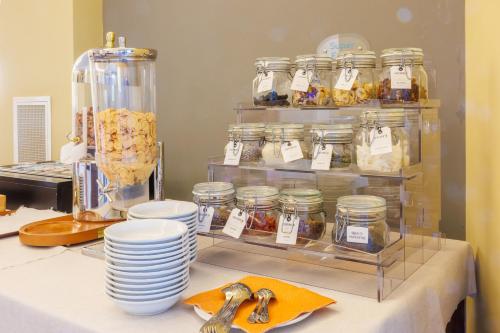 a kitchen with jars of food on a counter at Hotel Paradiso in Bardolino