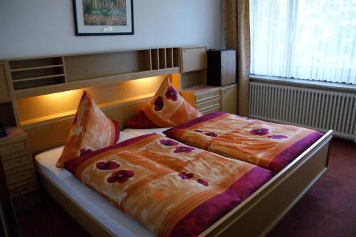 Postel nebo postele na pokoji v ubytování Hotel Pension Fernblick