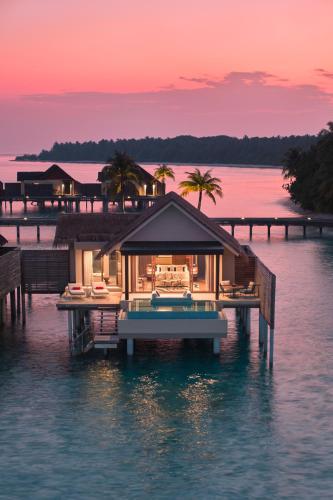 a house on a dock in the water at Niyama Private Islands Maldives in Dhaalu Atoll