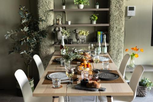 a wooden table with a thanksgiving meal on it at TOKYO Beverly Hills,Exclusive Lifestayle,SHIUYA,SHINJUKU,ART,Bespoke ApartmentSEIJO in Waizumi