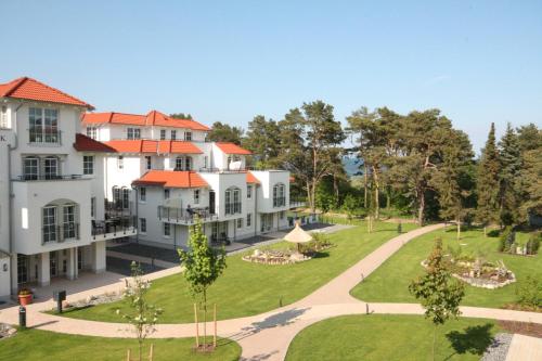 an aerial view of a building with a park at Haus Meeresblick - Ferienwohnung Am Strand (Ref. 128682u1) in Baabe