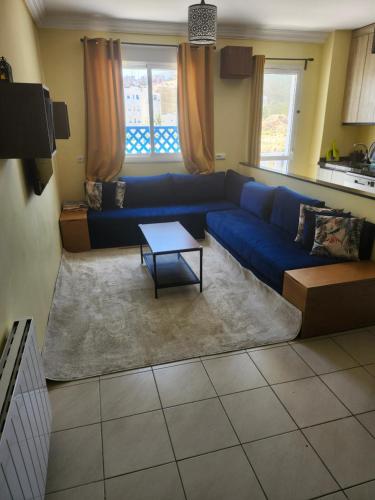 Posezení v ubytování Appartement bien équipé à 5 min de la plage, TOUT INCLU!