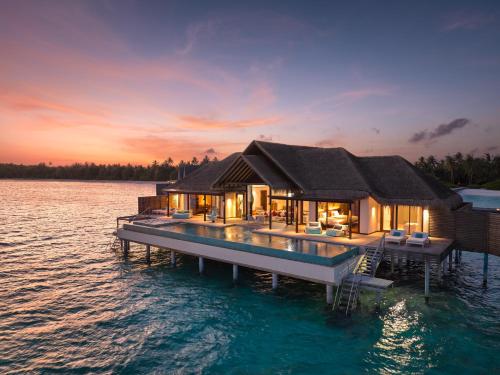a house on a dock in the water at Niyama Private Islands Maldives in Dhaalu Atoll