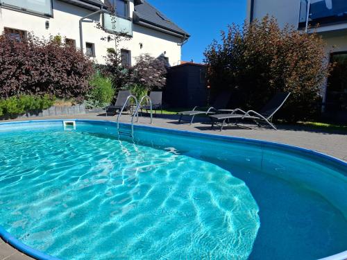 Bazén v ubytovaní Martinus Apartments alebo v jeho blízkosti