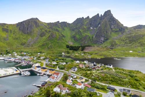 an aerial view of a small town next to a body of water at KB Reinholmen house in Ballstad