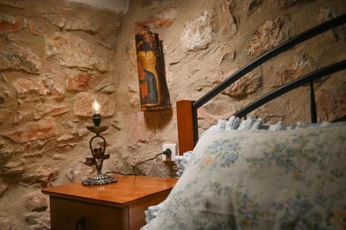 Letto o letti in una camera di Kivotos Mani