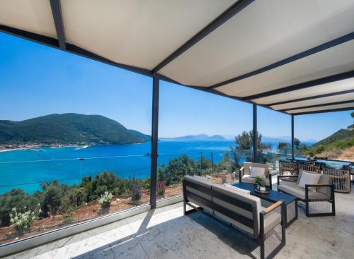 a house with a view of the ocean at Azzura villas in Vasiliki