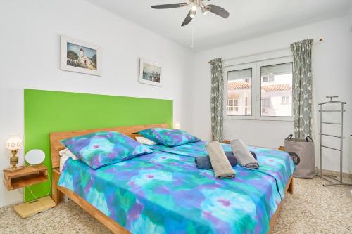 Ένα ή περισσότερα κρεβάτια σε δωμάτιο στο Sirena