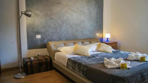 Ένα ή περισσότερα κρεβάτια σε δωμάτιο στο Loveweekends with Duomo View