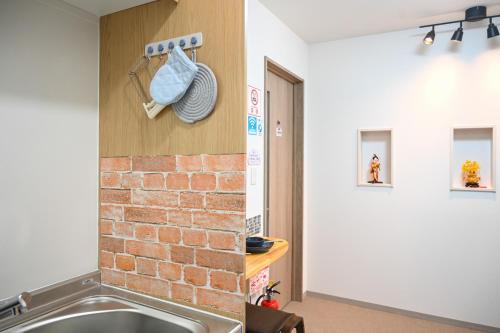 Ένα μπάνιο στο 大阪梅田淀川花民宿201套房