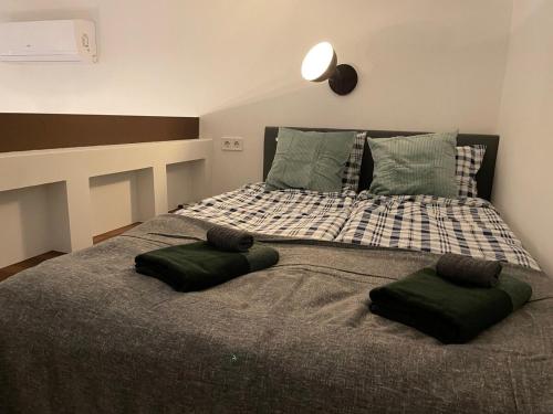 Ένα ή περισσότερα κρεβάτια σε δωμάτιο στο Super cozy loft studio