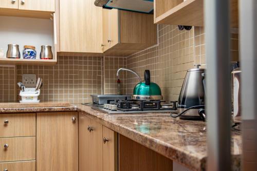 Cucina o angolo cottura di Westlodge at Graskop B&B
