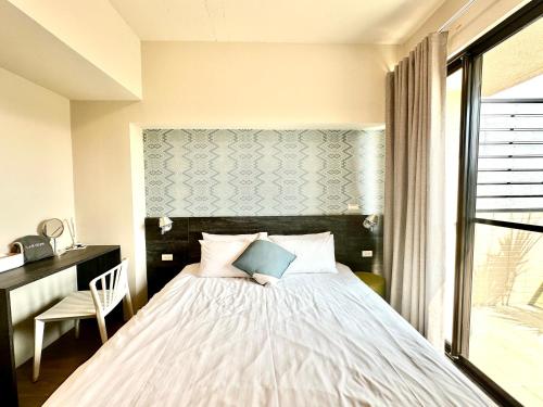 Una cama o camas en una habitación de Mo