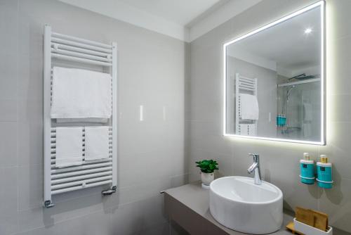 Koupelna v ubytování Novotel Parma Centro