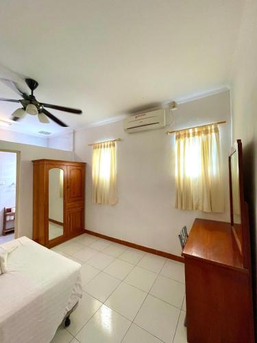 Postel nebo postele na pokoji v ubytování Timor Lodge