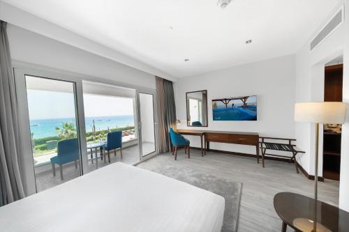 Ένα ή περισσότερα κρεβάτια σε δωμάτιο στο Porto Sokhna Hotel & Spa
