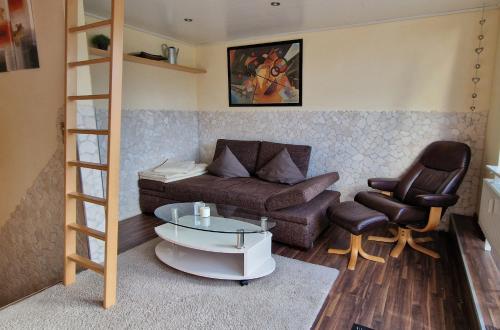 Χώρος καθιστικού στο Komfort-Fewo Maisonette-Traum- für Genießer