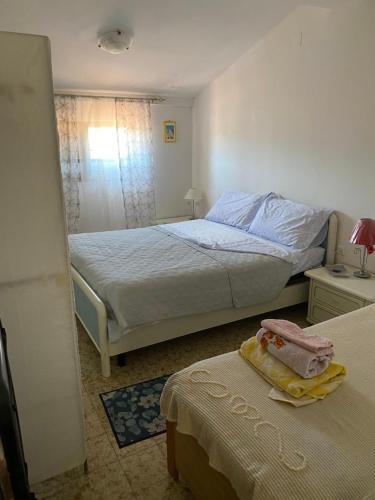Ein Bett oder Betten in einem Zimmer der Unterkunft Residence Della Corte Tocco Casauria Pescara