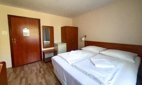 City Hostel tesisinde bir odada yatak veya yataklar