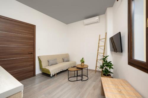 TV a/nebo společenská místnost v ubytování Mulberry Apartments