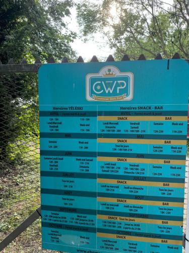 a sign for the wp parkingasyasy bar at Home in Oiry in Oiry