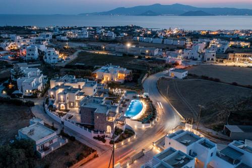 an aerial view of a city at night at Niléa Island Living in Agia Anna Naxos