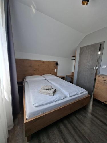 Ένα ή περισσότερα κρεβάτια σε δωμάτιο στο Apartament Holiday MiS