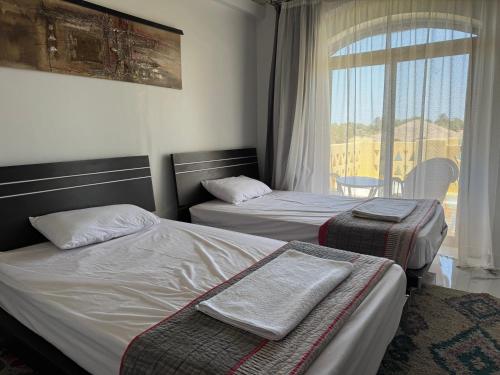Katil atau katil-katil dalam bilik di NEXT STAY, 3BR Villa, El Gouna