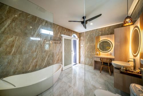 Ένα μπάνιο στο Dikubu Bali Villa and Suites