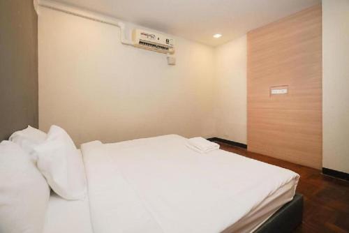 Ένα ή περισσότερα κρεβάτια σε δωμάτιο στο GO INN Silom BTS Surasak สถานีสุรศักดิ์