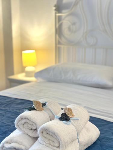 Postel nebo postele na pokoji v ubytování Nikos Apartment