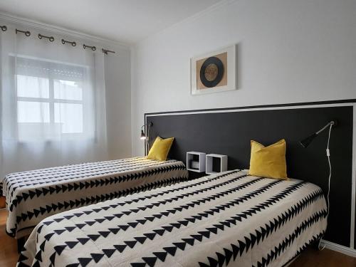 Ένα ή περισσότερα κρεβάτια σε δωμάτιο στο Cozy Island Apartment II RAAL 2162