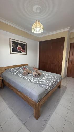 Ένα ή περισσότερα κρεβάτια σε δωμάτιο στο D&V Apartment