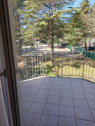 an open door with a view of a park at Belvedere Resort Hotels in Izola