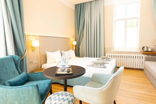 Χώρος καθιστικού στο Hotel Germania
