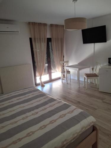 Postel nebo postele na pokoji v ubytování Guest House Tena