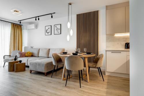 Ένα ή περισσότερα κρεβάτια σε δωμάτιο στο Porta Mare DeLux Marina