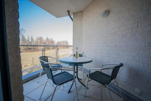 Balkón nebo terasa v ubytování Inselblume 14 - Blaue Ferienwohnung mit Balkon am Südstrand
